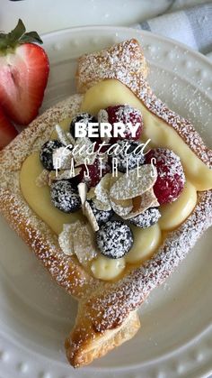 berry dessert with powdered sugar on white plate