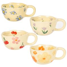 three cups with flowers painted on them