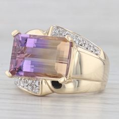 Gemstone Information: - Natural Ametrine - Total Carats - 7.3ct Cut - Emerald Color - Purple and Orange - Natural Diamonds - Total Carats - .10ctw Cut - Single Color - H-I Clarity - SI1-SI2 Metal: 14k Yellow Gold Weight: 10.1 Grams  Stamps: 14k  Face Height: 17.2mm  Rise Above Finger: 8.2mm Band / Shank Width: 3.6mm This ring is a size 9, but it can be resized down 1 size for a $20 fee or up 2 sizes for a $30 fee per size If you would like your ring resized, please select the appropriate fee from the listing below in order to pay the sizing fee: https://www.etsy.com/listing/781388346/ring-sizing-service-fee Each piece is thoroughly examined and refinished as needed by our professional jewelers, graded by our in-house GIA (Gemological Institute of America) Graduate Gemologist, and inspected Fine Jewelry Hallmarked Emerald Cut Amethyst Ring, Yellow Gold Emerald-cut Amethyst Ring For Formal Occasions, 14k Gold Multi-stone Emerald Cut Rings, 14k Gold Emerald-cut Amethyst Ring, Hallmarked Emerald-cut Amethyst Jewelry, Mens Custom Jewelry, Silver Flatware, Emerald Color, Cocktail Rings