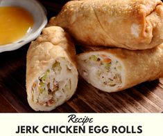 chicken egg rolls with dipping sauce on the side