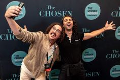 two people taking a selfie on the red carpet