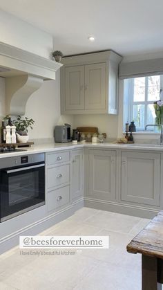 the kitchen is clean and ready for us to use in its new owner's home