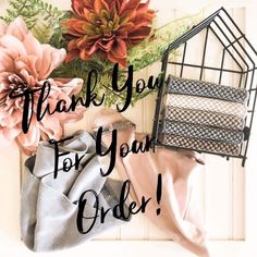 thank you for your order with flowers, blankets and a birdcage on the wall