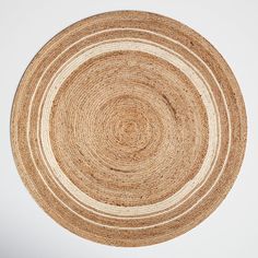 a round placemat made out of jute on a white surface with no background