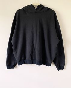 "Description: Black oversized heavy weight hoodie with side pockets. Super soft and plush. Condition:  Very good. (Never worn - Please see pics).  Measurements: Approx. Length: 25\" HPS, Chest (Flat across the underarm): 26 1/2\", Sleeve length: 23 1/2\" ALL SALES FINAL - Please check and compare measurements to something you own before purchasing. Most of my products are vintage/used, so please check pictures and feel free to ask questions. Thank you." Comfy Black Hoodie For Streetwear, Comfy Long Sleeve Black Hoodie, Comfy Black Hoodie For Fall, Oversized Crew Neck Hoodie With Pockets, Comfy Black Cotton Hoodie, Comfy Black Relaxed Fit Hoodie, Cozy Black Cotton Sweats, Black Hooded Sweats With Relaxed Fit, Oversized Solid Sweats With Double-lined Hood