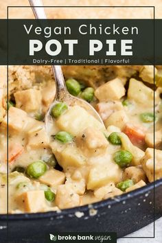 vegan chicken pot pie with peas and potatoes in a black skillet on a white surface