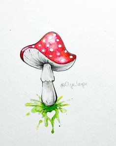 a watercolor painting of a mushroom on white paper