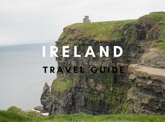 the words ireland travel guide are in front of an image of a cliff face with grass growing on it