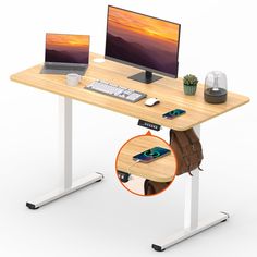 a computer desk with two monitors and a laptop on it's stand up leg