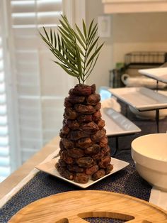 a pine cone is sitting on top of a plate