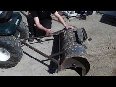 a man is working on an old metal object