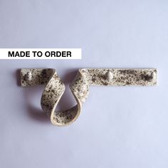 an object made to order on a white background with the words made to order above it