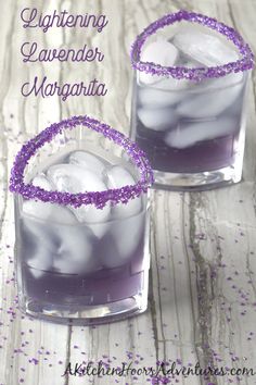 two glasses filled with ice and purple beads