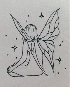 a drawing of a fairy sitting on the ground with stars around her legs and wings