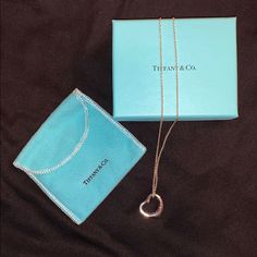 Sterling Silver Authentic Tiffany And Co. Elsa Perretti Open Heart Necklace. Size 16mm. Worn Only A Handful Of Times And Has Been Stored In Original Bag And Box. In Excellent Condition. Jewelry Tiffany And Co, Jewelry Tiffany, Open Heart Necklace, Tiffany Necklace, Tiffany Co Jewelry, Tiffany And Co, Original Bags, Necklace Size, Open Heart