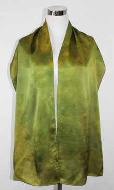 "Hand dyed 12mm satin silk, 14\"x72\" Light green abstract satin scarf, this elegant scarf is one of kind and ready to ship. These are a medium weight silk with a great drape and flow. Silky with an extremely smooth shiny top surface, this is what many people think of when they think \"silk\". Nice when you want something more luxurious and less sheer. The lustrous satin surface is wonderful for painting! They have hand rolled hems with 100% silk thread Product information: Designer - Mary Jane Green Silk Scarves For Formal Occasions, Green Silk Scarf For Formal Occasions, Formal Green Silk Scarves, Formal Green Silk Scarf, Elegant Green Satin Silk Scarf, Artistic Hand Dyed Green Silk Scarf, Artistic Hand-dyed Green Scarves, Elegant Scarf, Elegant Scarves