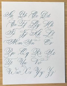 the upper and lower letters are in cursive writing, with black ink on white paper