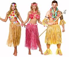 three people dressed in hula skirts and leis, one is holding a stick