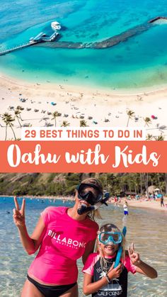 two girls in pink shirts and goggles on the beach with text overlay that reads 25 best things to do in oahu with kids