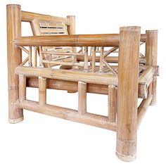 a wooden bench made out of bamboo sticks