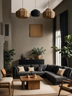 a living room filled with lots of furniture next to a large window and potted plant