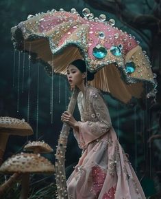 a woman with an umbrella is walking in the rain and has beads on her head