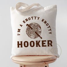 a tote bag that says i'm a knotty knotty hooker