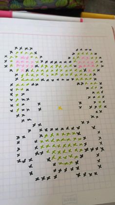 an image of a cross stitch pattern that looks like a cat