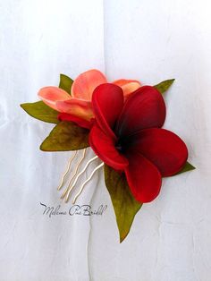 Aloha! New for 2022 - Real Touch Hawaiian Plumeria hair comb in Red and Hawaiian Sunset. Custom Designed Double Hawaiian Plumeria hair comb or clip - Inspired by Nature. This is a smaller, more petite hair clip - approx. 4 inches in length. Each Plumeria is hand wired (not hot glued) with Real Swarovski crystal centers. Finished with custom tropical leaves. Perfect for anytime wear but spectacular for Brides, Destination Wedding, Bridesmaids, cruise, formal, wedding, prom or special events. I fi Hawaiian Hair, Hawaiian Flower Hair, Tropical Hair, Hawaiian Hairstyles, Hawaiian Plumeria, Flower Hair Pieces, Real Touch Flowers, Hawaiian Party, Hair Flower