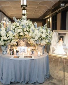 a table with flowers and pictures on it