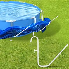 an above ground swimming pool in the grass