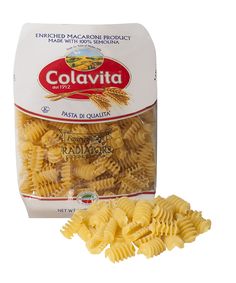 the bag of pasta is next to it's packaging