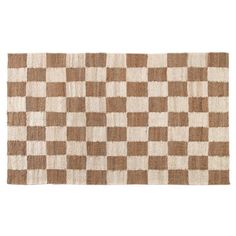 a brown and white checkered rug on a white background with no one in it