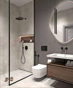 a bathroom with a toilet, sink and shower in it's center area is shown