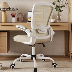 a white office chair sitting on top of a wooden desk