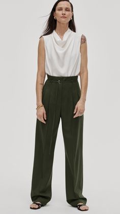 Made of a year-round, refined Italian stretch wool, this high-waisted trouser features a straight tapered leg and removable belt. The lightweight fabric is naturally temperature regulating and odor and wrinkle resistant. Functional details include side slash pockets and back welt pockets. Pairs well with an elevated top or the Single Button Blazer in Seasonless Wool. Womens Wool Pants, Deep V Bodysuit, Cowl Top, Single Button Blazer, Good To See You, Double Breasted Blazer, Blazer Buttons, Silk Crepe, High Waisted Trousers