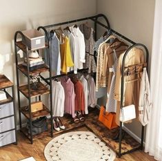 an organized closet with clothes and shoes