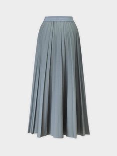 This Pleated Skirt in Slate Blue features a flattering 37 inch length. The pleated design adds dimension to your look, while the rich color adds a touch of sophistication. Solid Pleated Skirt With Stretch, Solid Stretch Pleated Skirt, Solid Stretch Pleated Skirt With Pleated Hem, Pleated Stretch Skirt With Pleated Hem, Chic Blue Accordion Pleated Skirt, Elegant Blue Pleated Skirt With Accordion Pleats, Elegant Blue Pleated Skirt, Fitted Blue Bottoms With Accordion Pleats, Blue Skirted Bottoms With Pleated Hem