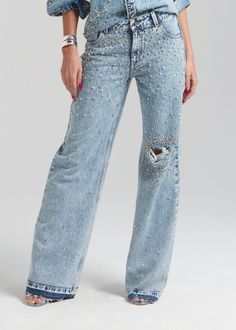 Dazzle in denim with our Bronte Wide Leg Jean. This on-trend silhouette in acid wash denim features light distressing at the knee and all-over crystal embellishments. Wear it with our matching Doreen Denim Shirt for a sexy take on the Canadian tuxedo. Shown here in Arctic Crystal. 100% Cotton Made in India Model is 510 Denim And Rhinestone Outfit, Denim And Diamonds Outfit, Bedazzled Jeans, Plus Size Workwear, Australia Clothes, Rhinestone Jeans, Canadian Tuxedo, Denim And Diamonds, Womens Denim