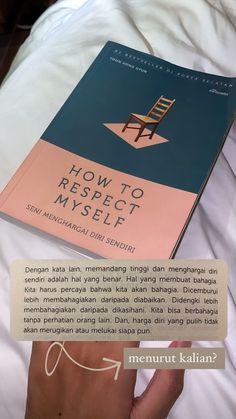 a book about how to respect myself is being held up by someone's hand