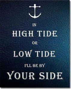 a sign that says in high tide or low tide i'll be by your side