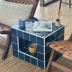 a chair and side table in a room