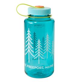 a blue water bottle with trees on it