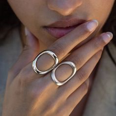 Expertly crafted in sterling silver, this wearable work of art is an emboldened version of our signature piece, the perennially popular Continuity Ring. We gave this juicier version just enough self-assured heft to take things up a notch for those who believe more is more. As with most of our pieces, this ring is designed for daily wear, so it's a super comfortable symbol of the power of perseverance and the continuous cycle of life. ◆ Made to order ◆ Approximately 28mm tall, 2mm thick ◆ Solid S Timeless Metal Open Ring Jewelry, Modern Jewelry With Ring Detail For Formal Events, Timeless Open Metal Ring, Sterling Silver Jewelry With Ring Detail For Formal Occasion, Formal Sterling Silver Jewelry With Ring Detail, Minimalist Sterling Silver Rings With Polished Finish, Modern Jewelry Ring For Anniversary, Minimalist Hallmarked Sterling Silver Rings, Modern Hand Forged Jewelry For Anniversary