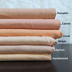 four different types of linens stacked on top of each other, labeled with names