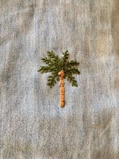 a small palm tree made out of jeans