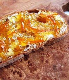 there is a piece of bread with orange toppings on it