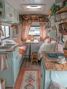 the interior of a camper is decorated in pastel colors