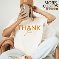 Check out more of what we offer!! Find our Etsy shops at: https://amoremiodesignllc.etsy.com https://chicsipsboutique.etsy.com THANK YOU FOR SHOPPING WITH US Get ready to embrace the cozy and festive fall season with our, Thankful Thanksgiving t shirt! This t shirt is printed on a high-quality Comfort Colors t shirt, ensuring both style and comfort. The minimalistic font adds a touch of elegance to the simple statement of "Thankful". It's the perfect way to express how grateful you are for every Thanksgiving Dinner Party, Thanksgiving Color, Thanksgiving Family, Pumpkin Picking, Thanksgiving Christmas, Apple Picking, Thanksgiving Shirts, Fall Gifts, Thanksgiving Gifts