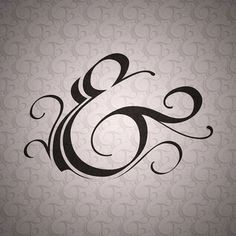 the letter e is made up of black swirls on a light gray wallpaper